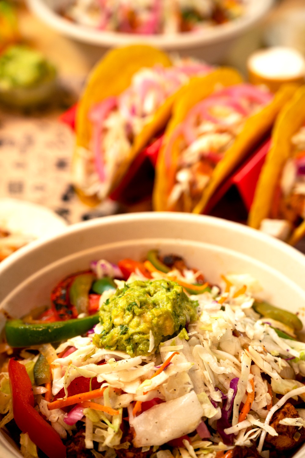 A burrito held up close in front of the camera.