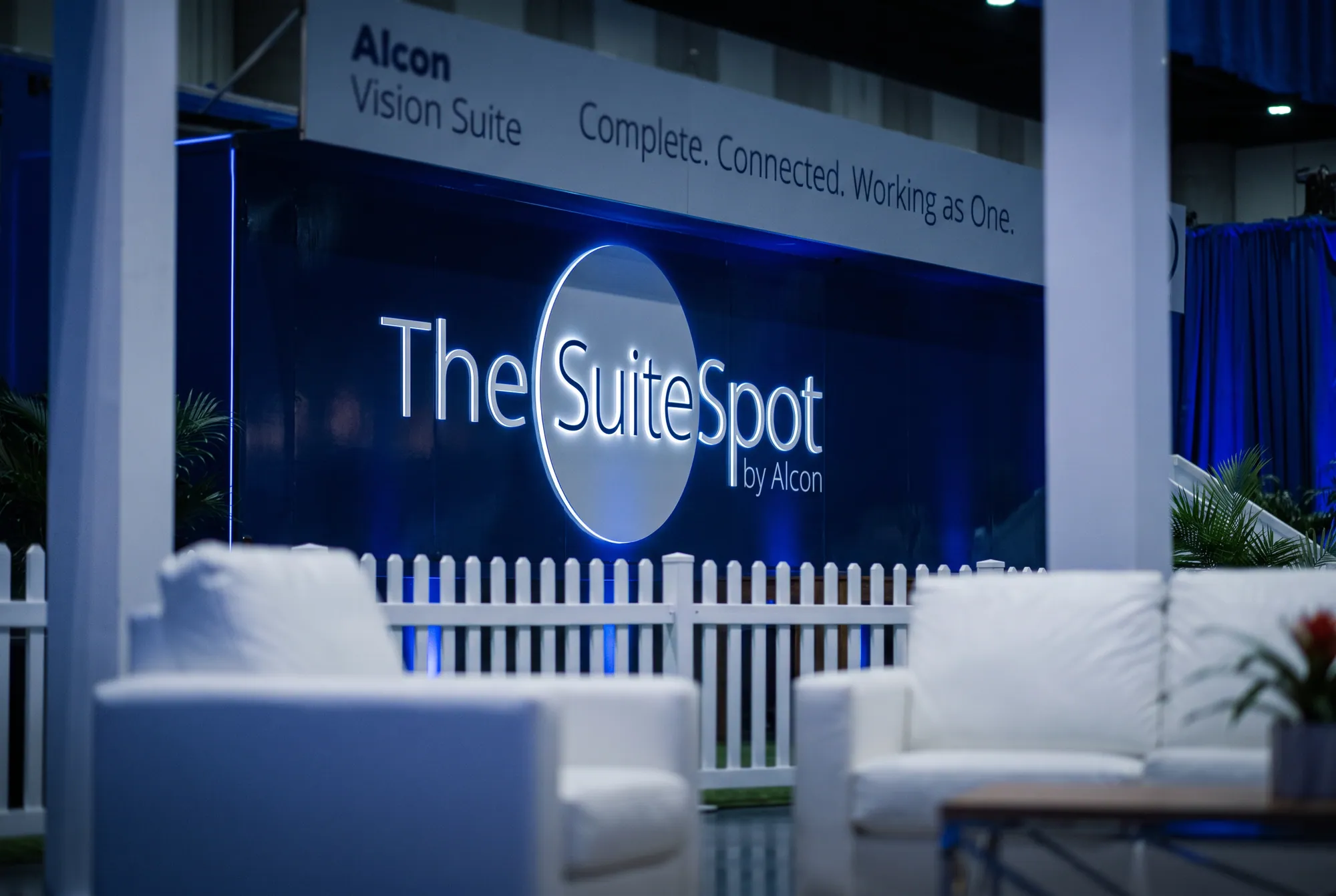 Close-up of the illuminated Suite Spot signage above the lounge area.